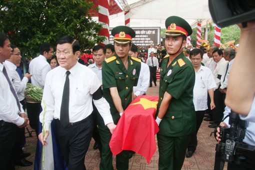 Chủ tịch nước dự lễ truy điệu và an tang hài cốt liệt sĩ hi sinh tại Nhơn Trạch,  Đồng Nai - ảnh 1
